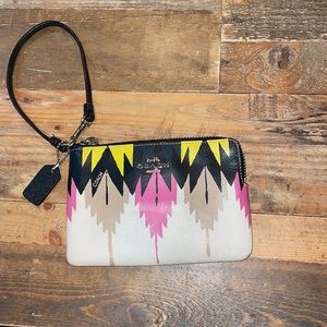 Coach “Aztec”style leather wristlet